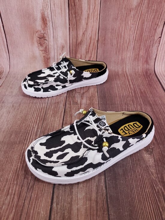 Hey Dude Shoes - Hey Dude Womens Size 7 Wendy Slip On Classic White Black Cow Print Shoes